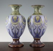 A pair of Doulton Lambeth stoneware ovoid vases, by Eliza Simmance, c.1910, 13.5in. A pair of