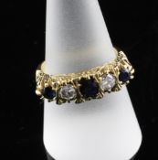 An Edwardian style gold five stone sapphire and diamond dress ring, size R. An Edwardian style