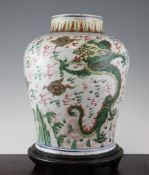 A Chinese wucai baluster vase, Transitional period, 17th century A Chinese wucai baluster vase,