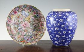 A Chinese famille rose millefleur dish & a Chinese jar A Chinese famille rose millefleur dish,