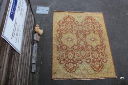 A Central European carpet, 11ft 1in by 8ft 8in. A Central European carpet, with two central