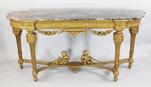 A Louis XV style carved giltwood and marble topped console table, W.6ft A Louis XV style carved