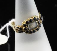 A Victorian 18ct gold and jet memorial ring, size P. A Victorian 18ct gold and jet memorial ring,