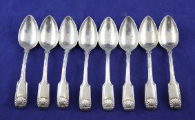 Set of eight early 19th century Portuguese silver fiddle, thread and shell pattern dessert spoons,