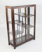 A 20th century Chinese rosewood glazed display cabinet, W.2ft 2.5in. A 20th century Chinese rosewood