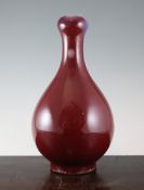 A Chinese sang de boeuf glazed garlic neck vase, 14.25in. (36.2cm) A Chinese sang de boeuf glazed