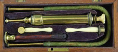 A Victorian cased brass and bone medical ear syringe instrument, 10in. A Victorian cased brass and