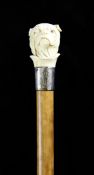 A Victorian carved ivory and malacca walking stick, 37in. A Victorian carved ivory and malacca