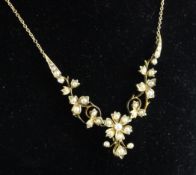 An Edwardian 15ct gold and seed pearl set necklace, 15.5in. An Edwardian 15ct gold and seed pearl