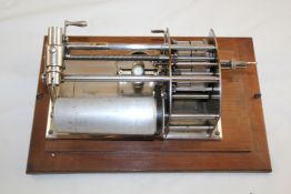 An early 20th century walnut cased cylinder phonograph, case overall 14in. An early 20th century