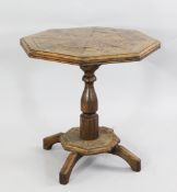 An Arts and Crafts oak octagonal specimen table An Arts & Crafts oak octagonal specimen table,