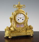 A 19th century French ormolu and porcelain mantel clock, 11in. A 19th century French ormolu and