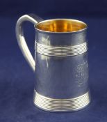 A George III silver mug, 10 oz. A George III silver mug, of restrained tapering form, with