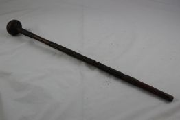 A South African Zulu hardwood knobkerrie, 30in. A South African Zulu hardwood knobkerrie, with bands