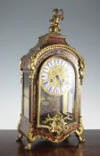 An early 20th century French Louis XV style red boulle mantel clock 19.5in. An early 20th century