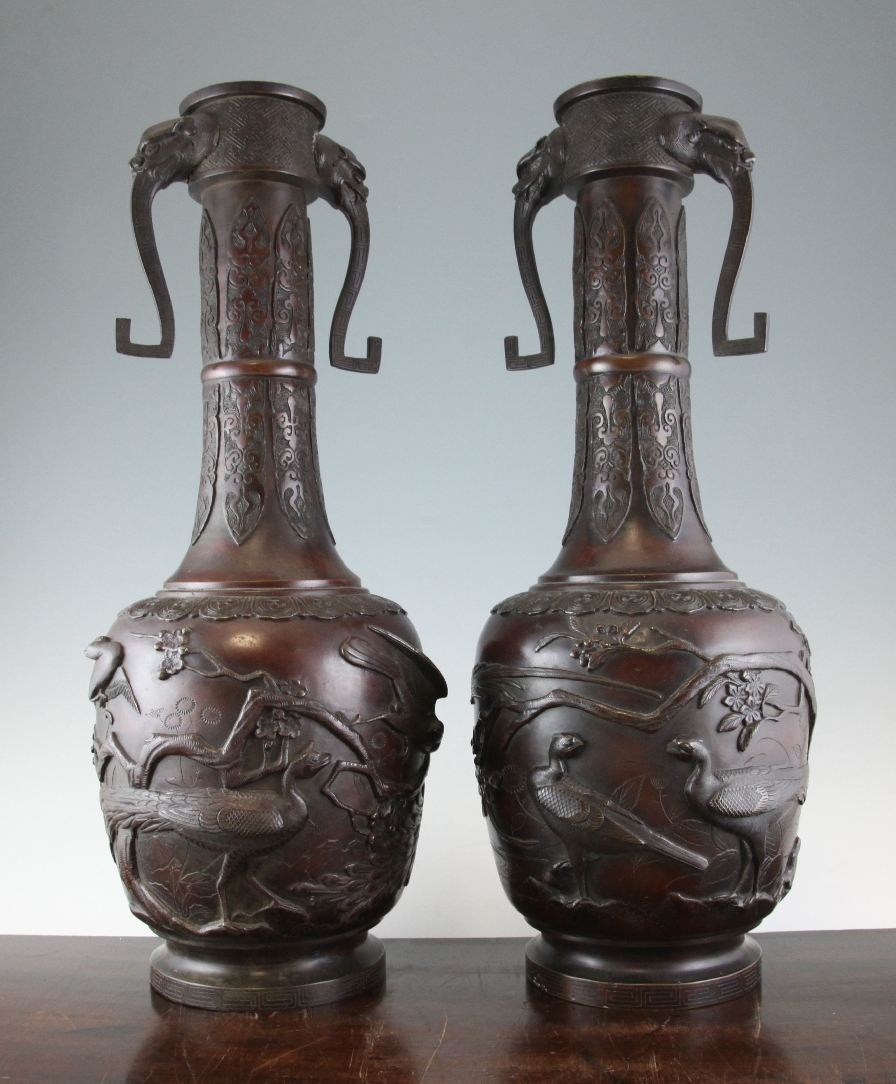 A pair of large Japanese bronze bottle vases, Meiji period, 23.25in. A pair of large Japanese bronze