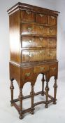 An 18th century and later walnut chest on stand, H.5ft 9in. An 18th century and later walnut chest