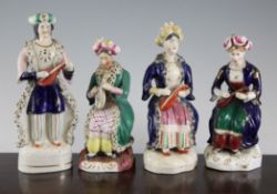 Four Staffordshire pottery figures of Turkish musicians, mid 19th century, 7.75in. Four