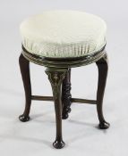 An Edwardian mahogany and ivory inlaid circular revolving piano stool, An Edwardian mahogany and