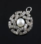 A white gold, cultured pearl and diamond cluster pendant, 1in. A white gold, cultured pearl and