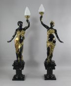 A modern pair of painted bronze figural Blackamoor lamps, 69in. A modern pair of painted bronze