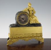 A 19th century French bronze and ormolu mantel clock, 12in. A 19th century French bronze and