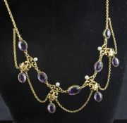 A Victorian 15ct gold, amethyst and seed pearl drop fringe necklace, 16.75in. A Victorian 15ct gold,