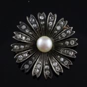 A Victorian gold and silver, diamond and cultured pearl set flowerhead brooch, 1.5in. A Victorian