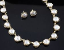 A continental gold and mother of pearl suite of jewellery, A continental gold and mother of pearl