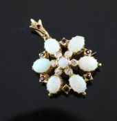 A gold, diamond, ruby and opal set pendant brooch, 1.25in. A gold, diamond, ruby and opal set