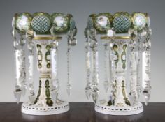 A pair of Bohemian table lustres A pair of Bohemian white and green overlaid glass table lustres,