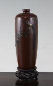 A Japanese bronze vase A Japanese bronze and mixed metal vase, Meiji period, decorated with a