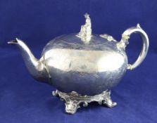 A Victorian silver teapot, gross 22.5 oz. A Victorian silver teapot, of spherical form, with