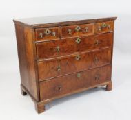 An early 18th century walnut chest, W.3ft 4in. An early 18th century walnut chest, of three short