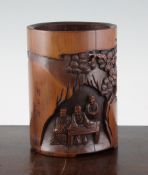 A Chinese bamboo brush pot, 6.2in. (15.6cm) A Chinese bamboo brush pot, carved in high relief with