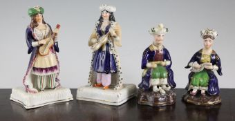 Four Staffordshire pottery figures of Turkish musicians, mid 19th century, 5.25in. Four