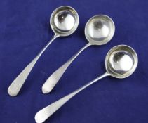 A pair of George III Scottish silver Old English pattern sauce ladles, 4.5 oz. A pair of George