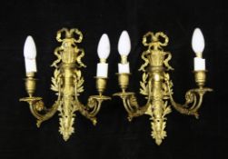 A pair of French ormolu twin branch wall lights, 15in. A pair of French ormolu twin branch wall