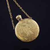 A 19th century French gold moon shaped scent flask, 2in. A 19th century French gold moon shaped