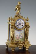 An early 20th century French gilt metal and porcelain mantel clock, 15.5in. An early 20th century