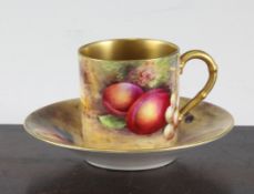 A Royal Worcester fruit painted cabinet coffee can and saucer, date code for 1930, 4.1in. A Royal