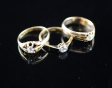 Three gold and solitaire diamond rings, sizes Q or R. Three gold and solitaire diamond rings, two