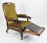 A Victorian mahogany reclining armchair A Victorian mahogany reclining armchair, upholstered in pale