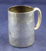 A Victorian silver mug, 10.5 oz. A Victorian silver mug, of cylindrical form, with presentation