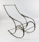 A Victorian shaped steel rocking armchair, A Victorian shaped steel rocking armchair, probably by