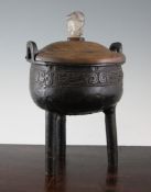 A Chinese bronze censer, Ding, late Ming Dynasty, 12in. (30.5cm) A Chinese bronze censer, Ding, late