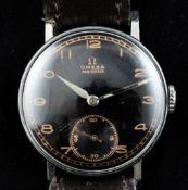 A late 1930`s stainless steel Omega manual wind wrist watch, A late 1930`s stainless steel Omega