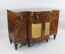 A Regency mahogany and brass inlaid breakfront sideboard, W.4ft 4in. A Regency mahogany and brass