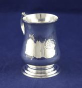 A George III silver mug, 7 oz. A George III silver mug, of baluster form, with engraved monogram and