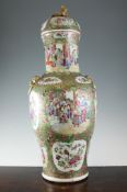 A large Chinese Canton decorated famille rose vase and cover A large Chinese Canton decorated